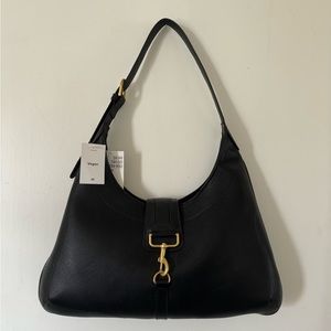 Black faux leather bag